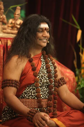 http://nithyananda.org/sites/default/files/photo-gallery/2015-01jan-26th-nithyananda-diary_IMG_1615_bidadi-nky-day4-shivoham-session-swamiji.JPG