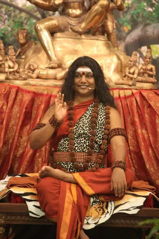 http://nithyananda.org/sites/default/files/photo-gallery/2015-01jan-26th-nithyananda-diary_IMG_1627_bidadi-nky-day4-shivoham-session-swamiji.JPG