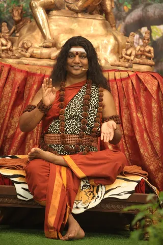 http://nithyananda.org/sites/default/files/photo-gallery/2015-01jan-26th-nithyananda-diary_IMG_1631_bidadi-nky-day4-shivoham-session-swamiji.JPG
