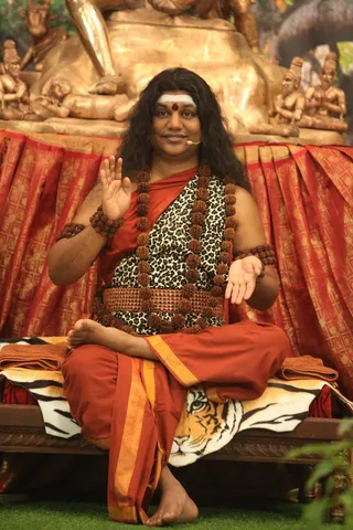 http://nithyananda.org/sites/default/files/photo-gallery/2015-01jan-26th-nithyananda-diary_IMG_1633_bidadi-nky-day4-shivoham-session-swamiji.JPG