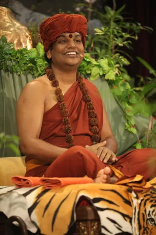 http://nithyananda.org/sites/default/files/photo-gallery/2015-02feb-12th-nithyananda-diary_IMG_5784_bidadi-satsang-swamiji.JPG