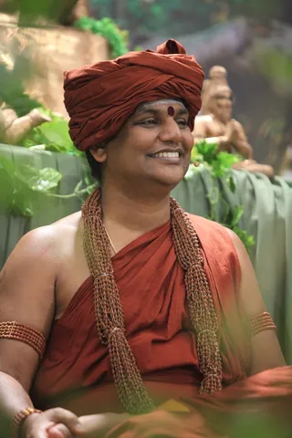 http://nithyananda.org/sites/default/files/photo-gallery/2015-03mar-01st-nithyananda-diary_IMG_1564_bidadi-satsang-swamiji_0.JPG