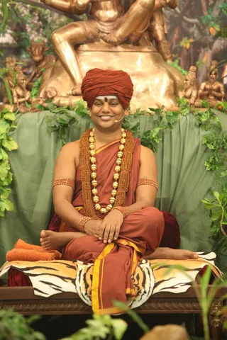 http://nithyananda.org/sites/default/files/photo-gallery/2015-03mar-20th-nithyananda-diary_IMG_5103_bidadi-satsang-swamiji.JPG