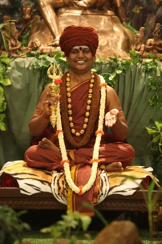 http://nithyananda.org/sites/default/files/photo-gallery/2015-03mar-20th-nithyananda-diary_IMG_5183_bidadi-satsang-swamiji.JPG
