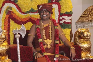 http://nithyananda.org/sites/default/files/photo-gallery/2015-07jul-06th-nithyananda-diary_IMG_4499_varanasi-guru-homa-swamiji_0.JPG
