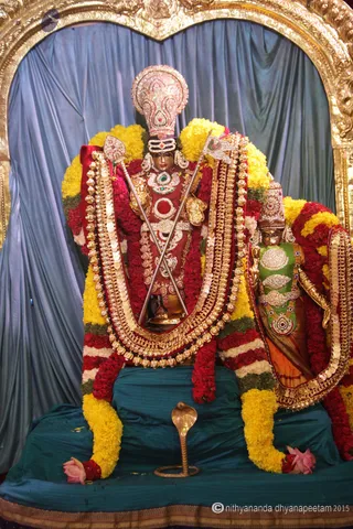 http://nithyananda.org/sites/default/files/photo-gallery/2015-07jul-13th_IMG_7813_varanasi-lord-muruga-with-spar-and-peacock-flag-nithyananda-diary_varanasi-swamiji-blessing-nithyananda-diary.JPG