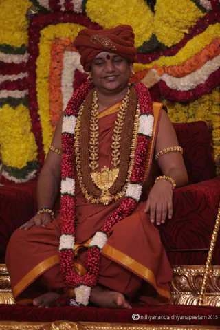 http://nithyananda.org/sites/default/files/photo-gallery/2015-07jul-13th_IMG_7834_varanasi-swamiji-gracing-the-marriage-ceremony-nithyananda-diary_varanasi-swamiji-blessing-nithyananda-diary.JPG