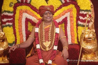 http://nithyananda.org/sites/default/files/photo-gallery/2015-07jul-13th_IMG_7853_varanasi-swamiji-gracing-the-marriage-ceremony-nithyananda-diary_varanasi-swamiji-blessing-nithyananda-diary.JPG