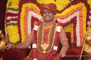 http://nithyananda.org/sites/default/files/photo-gallery/2015-07jul-13th_IMG_7860_varanasi-swamiji-gracing-the-marriage-ceremony-nithyananda-diary_varanasi-swamiji-blessing-nithyananda-diary.JPG