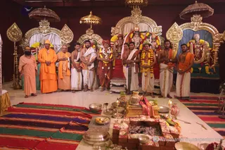 http://nithyananda.org/sites/default/files/photo-gallery/2015-07jul-13th_IMG_7936_varanasi-swamiji-with-mahanirvani-mahants-kasi-pandits-priests-marriage-ceremony-nithyananda-diary.JPG
