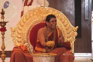 http://nithyananda.org/sites/default/files/photo-gallery/2015-07jul-15th-nithyananda-diary_IMG_8532_varanasai-ia-class-mahaswara-pooja-swamiji-offering%20food.JPG