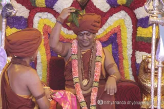 http://nithyananda.org/sites/default/files/photo-gallery/2015-07jul-9th-nithyananda-diary_IMG_5703_varanasai-rudra-homa-swamiji.JPG