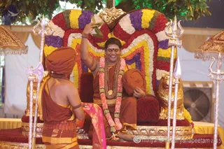 http://nithyananda.org/sites/default/files/photo-gallery/2015-07jul-9th-nithyananda-diary_IMG_5715_varanasai-rudra-homa-swamiji.JPG