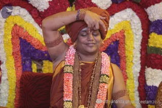 http://nithyananda.org/sites/default/files/photo-gallery/2015-07jul-9th-nithyananda-diary_IMG_5724_varanasai-rudra-homa-swamiji.JPG