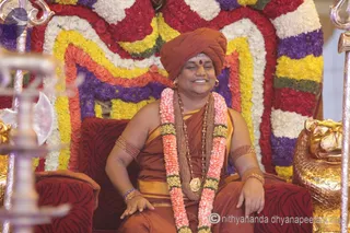 http://nithyananda.org/sites/default/files/photo-gallery/2015-07jul-9th-nithyananda-diary_IMG_5726_varanasai-rudra-homa-swamiji.JPG