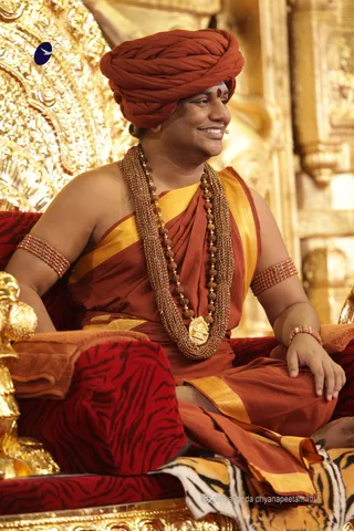 http://nithyananda.org/sites/default/files/photo-gallery/2015-08aug-26th-nithyanda-diary_IMG_9401_bidadi-satsang-swamiji.JPG