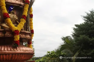 http://nithyananda.org/sites/default/files/photo-gallery/2015-09sep-08th_nithyanda-diary_IMG_3349_bidadi-ganesha-brahmotsav-flag-hosting-swamiji.JPG