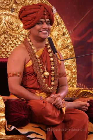 http://nithyananda.org/sites/default/files/photo-gallery/2015-10oct-13th-nithyananda-diary_IMG_5799_varanasi-ia-satsang-swamiji.JPG