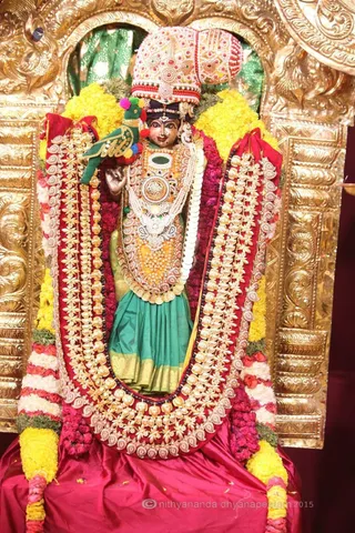 http://nithyananda.org/sites/default/files/photo-gallery/2015-10oct-18th-nithyananda-diary_IMG_7460_varanasi-ia-meenakshi-thirukalyanam-meenakshi_deity.JPG