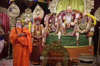 http://nithyananda.org/sites/default/files/photo-gallery/2015-10oct-18th-nithyananda-diary_IMG_8189_varanasi-ia-meenakshi-thirukalyanam-akhada-swamis-swamiji.JPG