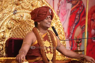 http://nithyananda.org/sites/default/files/photo-gallery/2015-10oct-22nd-nithyananda-diary_IMG_8983.JPG_varanasi-ia-satsang-vijayadashami-swamiji.JPG