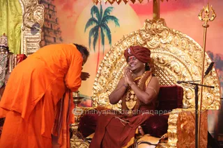 http://nithyananda.org/sites/default/files/photo-gallery/2015-10oct-22nd-nithyananda-diary_IMG_9020.JPG_varanasi-ia-satsang-vijayadashami-mahanirvani-puja-swamiji.JPG