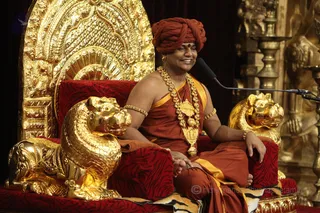 http://nithyananda.org/sites/default/files/photo-gallery/2015-11nov-09th-nithyananda-diary_IMG_2632_bidadi-raja-sabha-satsang-swamiji.JPG
