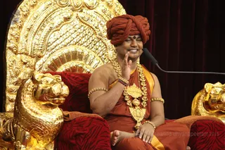 http://nithyananda.org/sites/default/files/photo-gallery/2015-11nov-09th-nithyananda-diary_IMG_2650_bidadi-raja-sabha-satsang-swamiji.JPG