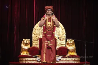 http://nithyananda.org/sites/default/files/photo-gallery/2015-11nov-10th-nithyananda-diary_IMG_2846_bidadi-raja-sabha-satsang-swamiji-blessing.JPG