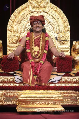 http://nithyananda.org/sites/default/files/photo-gallery/2015-11nov-10th-nithyananda-diary_IMG_2888_bidadi-raja-sabha-satsang-swamiji.JPG