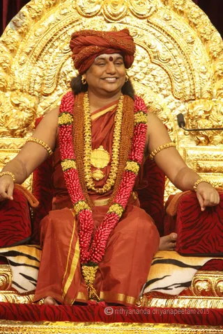 http://nithyananda.org/sites/default/files/photo-gallery/2015-11nov-10th-nithyananda-diary_IMG_2901_bidadi-raja-sabha-satsang-swamiji.JPG