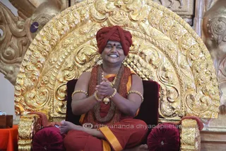 http://nithyananda.org/sites/default/files/photo-gallery/2015-11nov-19th-nithyananda-diary_IMG_9537_banglr-adheenam-nithyanandeshwara-brahmotsavam-culturals-bharatanatyam-swamiji_0.JPG
