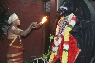Revered Lord Kalabhairava receives His lamp