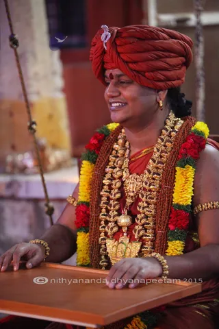 http://nithyananda.org/sites/default/files/photo-gallery/2015-11nov-25th-nithyananda-diary_IMG_4194_blr-adheenam-nithyanandeshwara-brahmotsavam-morning-bharani-swing-swamiji.JPG