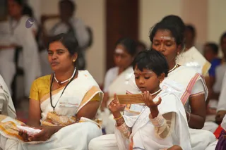 Participants chant the sacred mantra