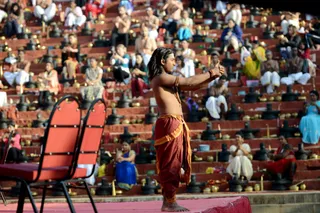 Demonstrating the Mudras, invoking Sadashiva into the Linga