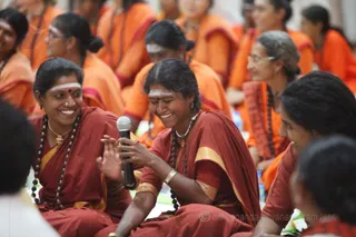 While everyone is consuming the prasad, it is tradition that the Sannyasis take turn singing devotional songs.