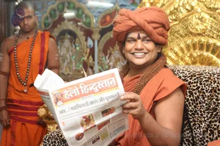 His Holiness enjoys reading the local newspapers, all of which are reporting all the wonderful events of His Camp here at Kumbh Mela!