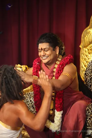 http://nithyananda.org/sites/default/files/photo-gallery/2016-4apr-4th-nithyananda-diary_IMG_8019_bengaluru-aadheenam-IA-day21-energy-darshan-swamiji.jpg