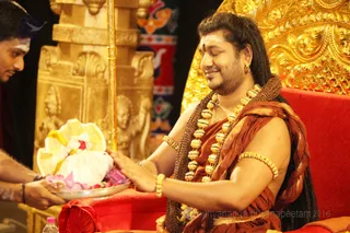 His Holiness blesses and energizes the offering for the Homa