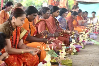 Varalakshmi Puja - It is necessary to keep the lamps burning during the whole puja, challenging on a breezy day!
