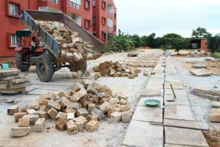 Construction around the Aadheenam