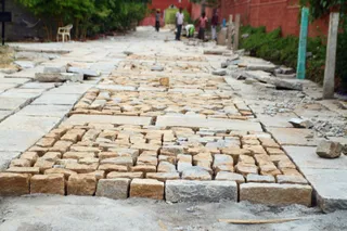 Construction around the Aadheenam