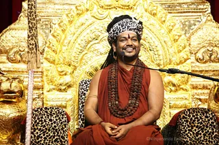 https://www.nithyananda.org/sites/default/files/photo-gallery/2017-08-Aug-27-nithyananda-diary_bengaluru-adheenam_initiation-into-mahasadashivoham_IMG_0341.JPG?1503905332