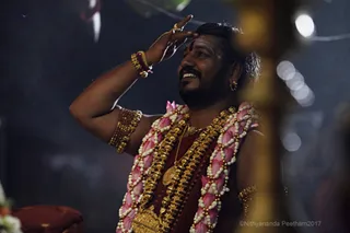 https://nithyananda.org/sites/default/files/photo-gallery/2017-11-Nov-23-nithyananda-diary_bengaluru-adheenam_nithyanandeshwara-brahmotsavam-dhwajarohanam_IMG_7190.jpg?1511454155
