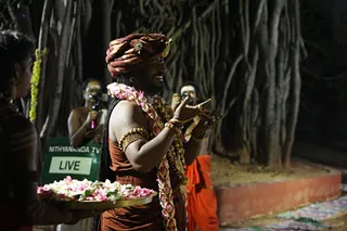 https://nithyananda.org/sites/default/files/photo-gallery/2017-11-Nov-23-nithyananda-diary_bengaluru-adheenam_nithyanandeshwara-brahmotsavam-dhwajarohanam_IMG_7305.jpg?1511454224