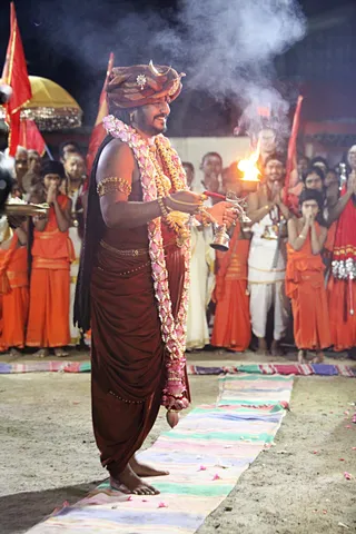 https://nithyananda.org/sites/default/files/photo-gallery/2017-11-Nov-23-nithyananda-diary_bengaluru-adheenam_nithyanandeshwara-brahmotsavam-dhwajarohanam_IMG_7605.jpg?1511454387