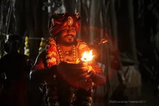 https://nithyananda.org/sites/default/files/photo-gallery/2017-12-Dec-02-nithyananda-diary_bengaluru-aadheenam_barani-deepam-nithyanandeshwara-temple_IMG_9230.jpg?1512289372