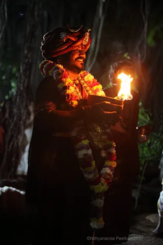 https://nithyananda.org/sites/default/files/photo-gallery/2017-12-Dec-02-nithyananda-diary_bengaluru-aadheenam_barani-deepam-nithyanandeshwara-temple_IMG_9280.jpg?1512289578