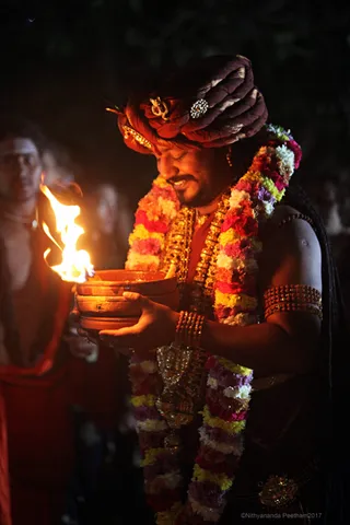 https://nithyananda.org/sites/default/files/photo-gallery/2017-12-Dec-02-nithyananda-diary_bengaluru-aadheenam_barani-deepam-nithyanandeshwara-temple_IMG_9290.jpg?1512289595